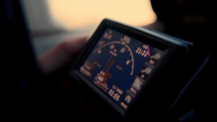 Digital navigation display showing illuminated flight indicators in lowlight conditions