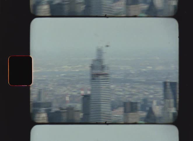 The tall tower is under construction in the city