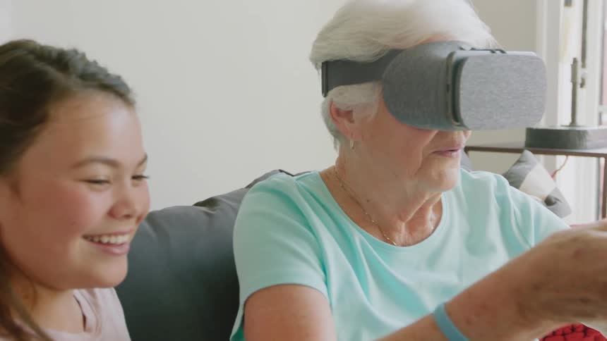A woman is using a vr headset