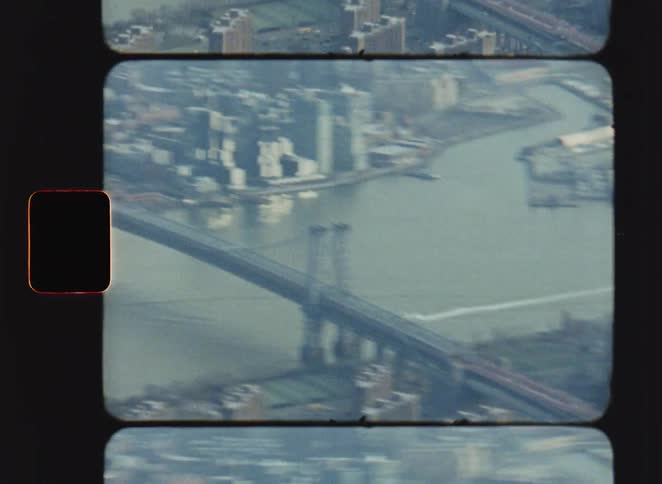 Bridge that crosses a river in the middle of a metropolis