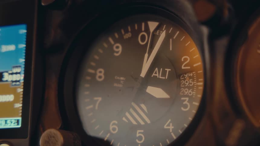 Aviation altitude gauge on the dashboard of a small airplane