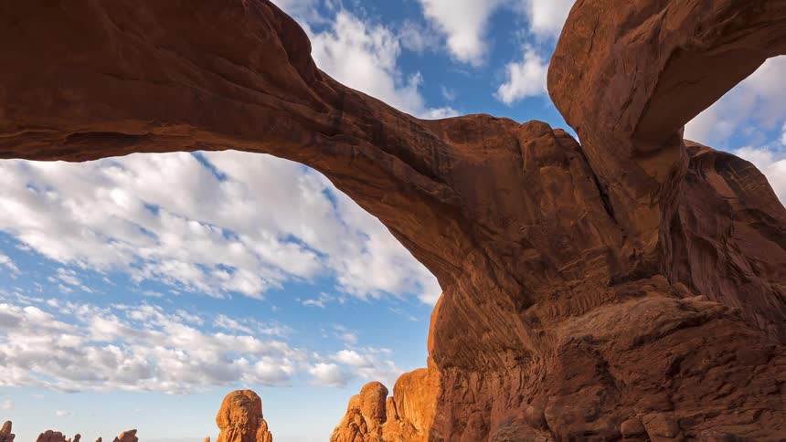 Sandstone arches within desert rock formations