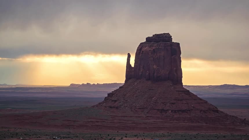 A time lapse of clouds moving above a mesa