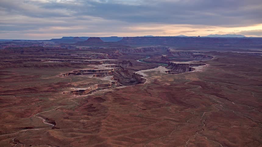 A view of a large canyon in the desert