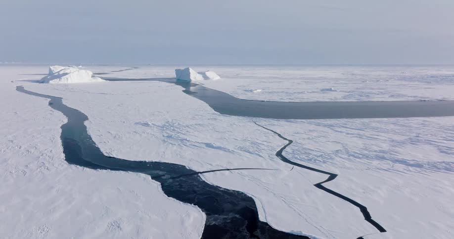 An aerial view of arctic ice and water