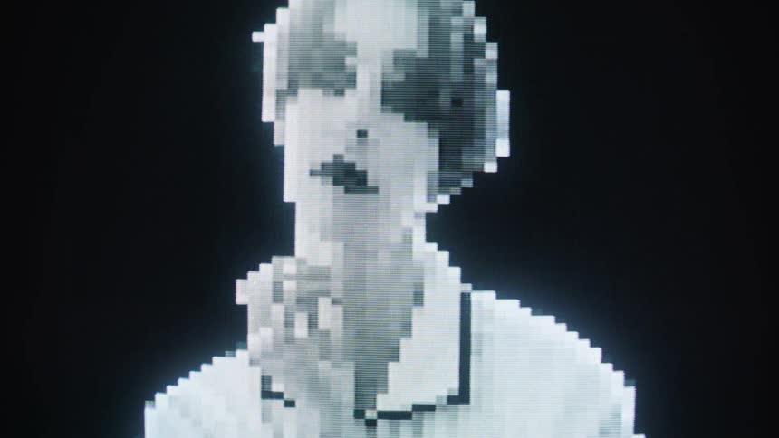 Screen displaying the abstract face of a woman