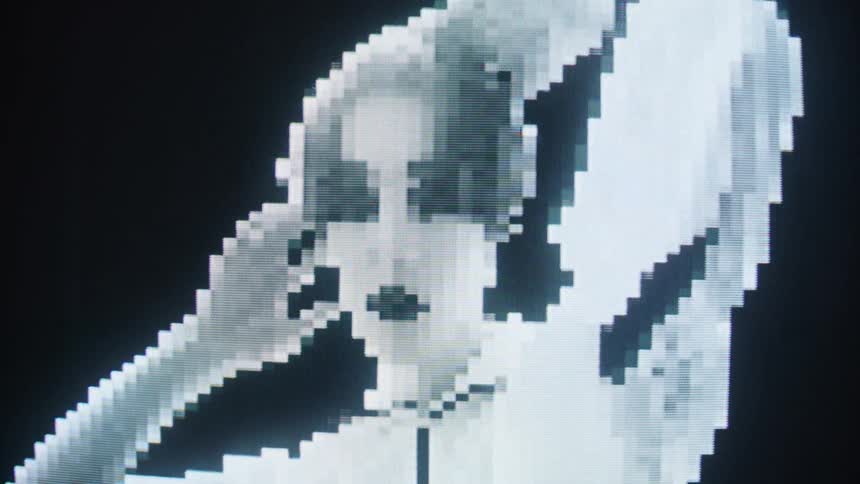 Pixelated image of a woman moving her arms around