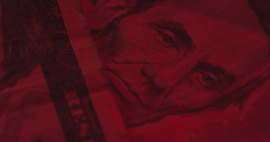 Extreme closeup of a detailed portrait printed on a paper currency note