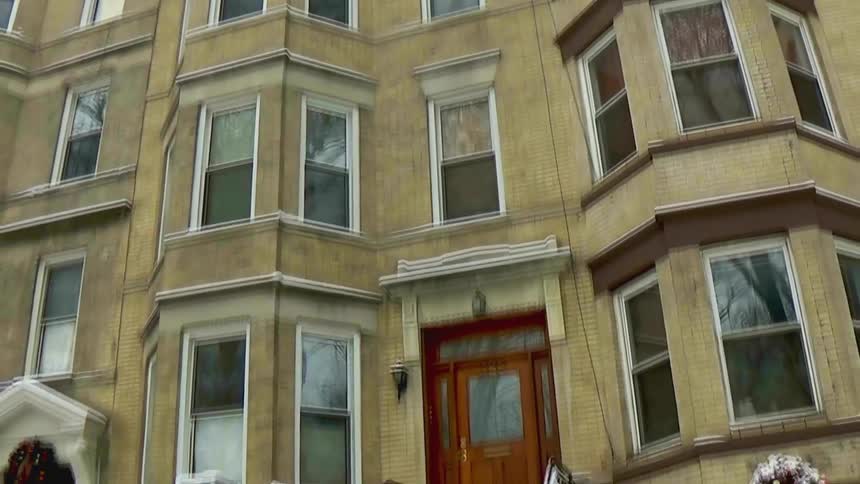 Christmas decorations on an apartment building on a winter day