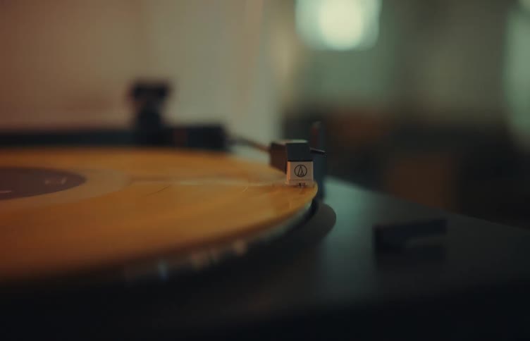 A close up of a record on a record player