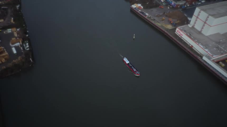An aerial view of a large river in a city