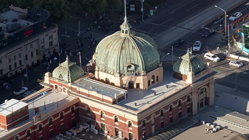 Historic building with a central dome seen from above in an urban area