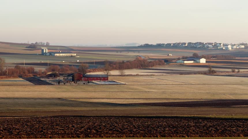 A view of farmland with fields