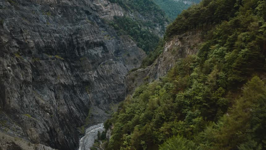 An aerial view of a canyon and mountains