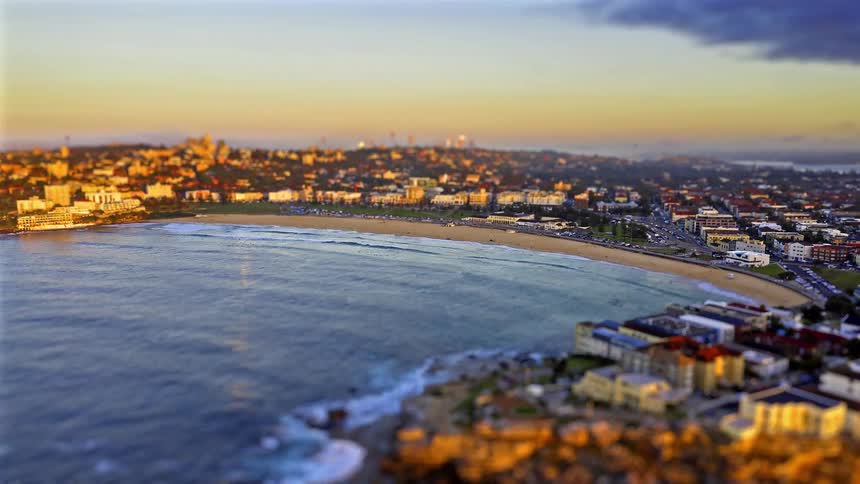 A time lapse of a large city along the coast
