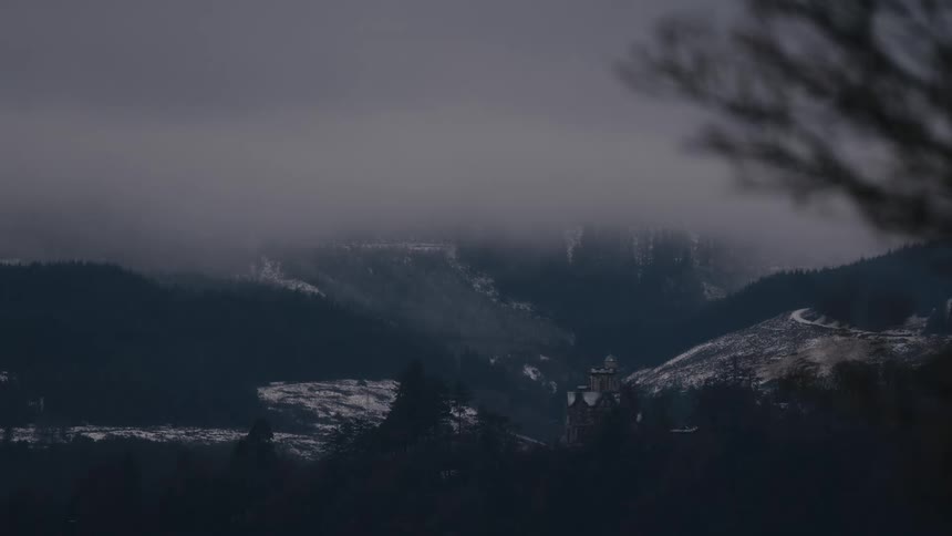 A view of a mountain covered in snow