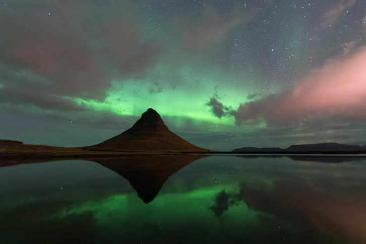 A view of the aurora over a mountain