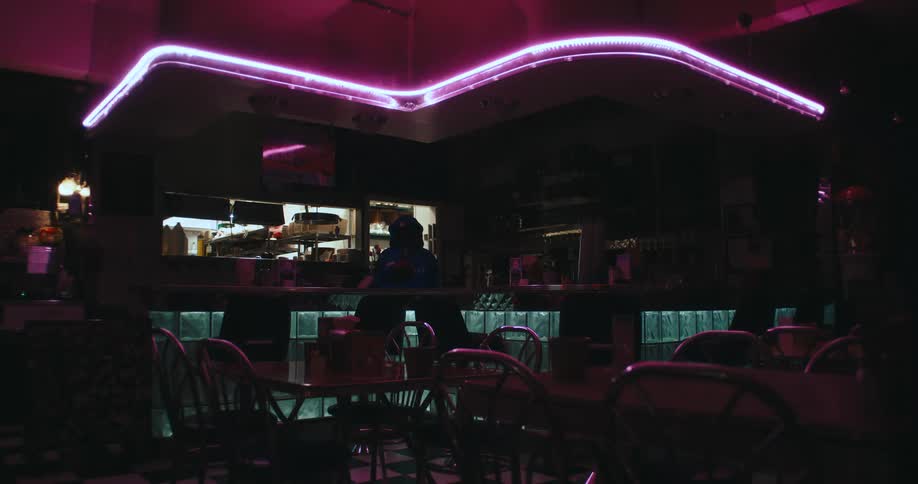 The restaurant is empty and dark