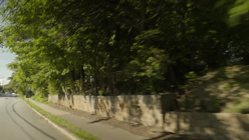 Traveling view of a city neighborhood
