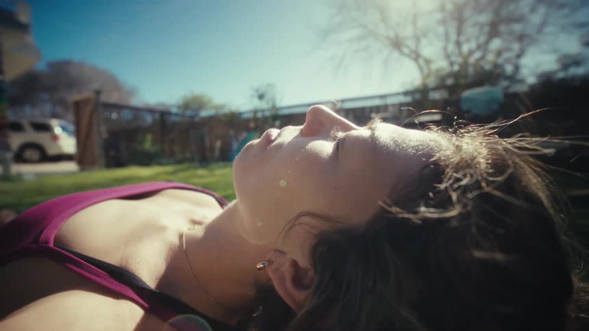 A woman doing yoga outdoors