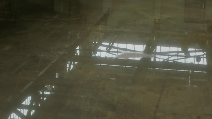 Water covers a warehouse floor