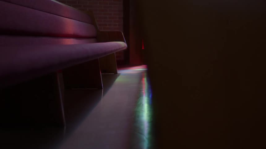 View of in between pew benches from a low level