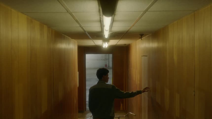 A person walks down the hall