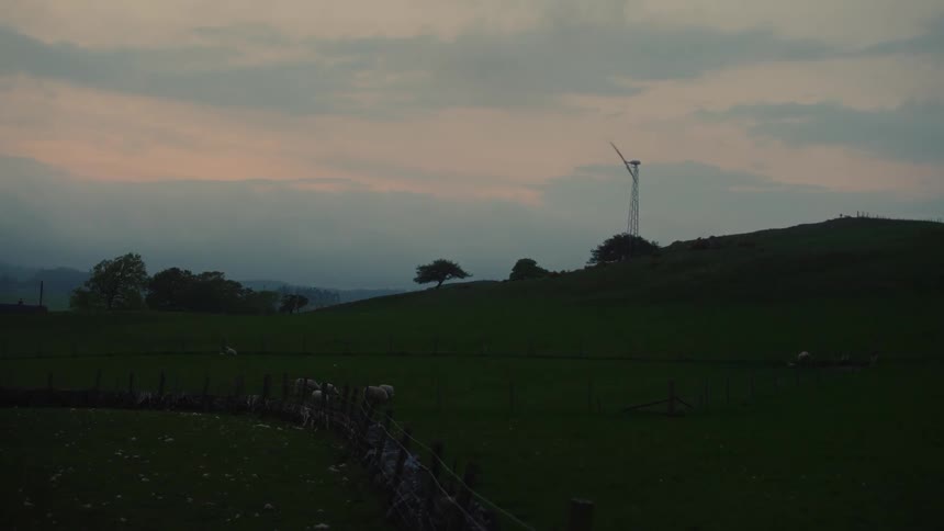 A windmill on the top of the hill