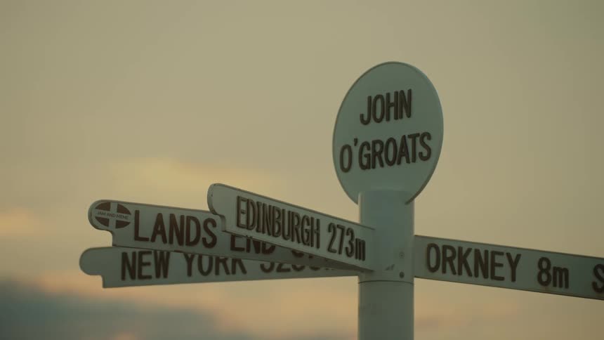 Street sign post indicating several directions of roads