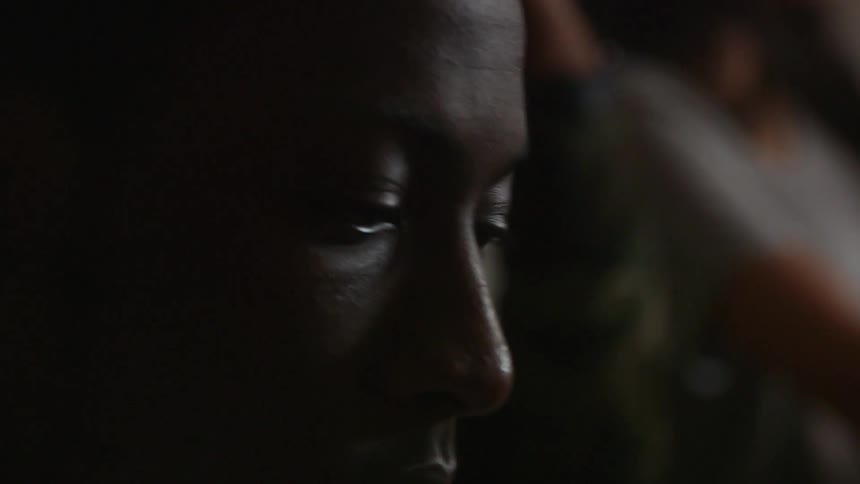A young man looks around