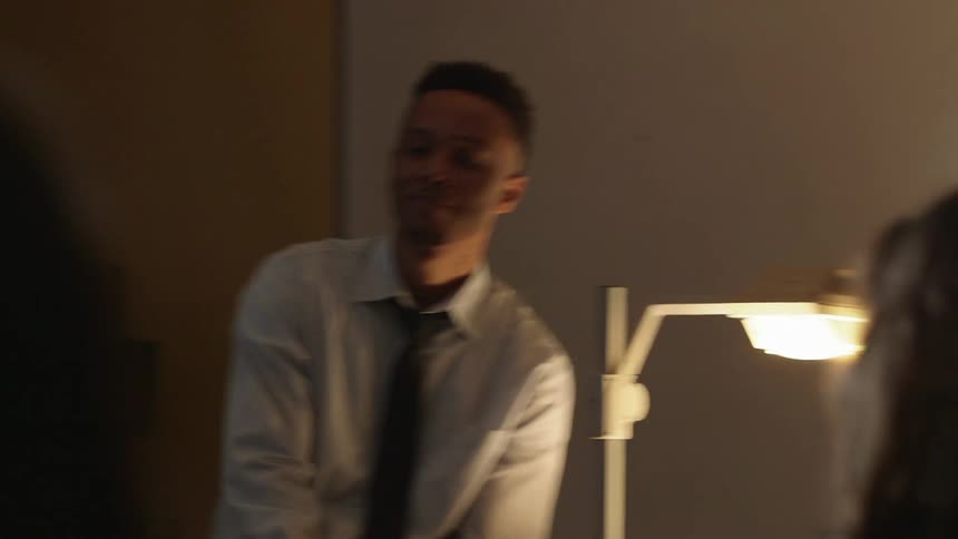 A man speaks to an audience
