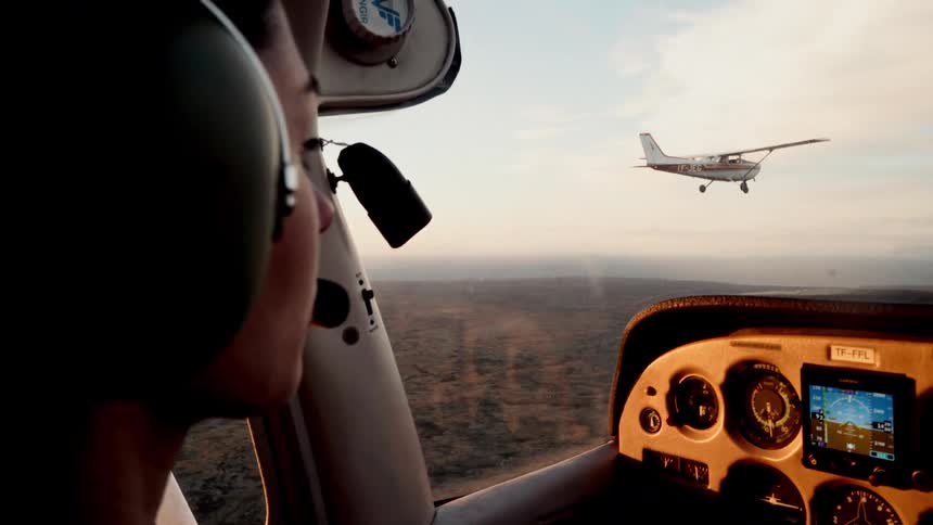 Two planes flying in the sky