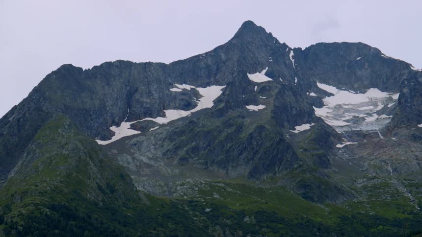 A mountain on a cloudy day