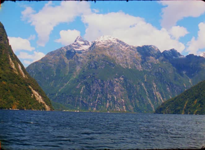 River flowing in the mountain valley under a cloudy sky