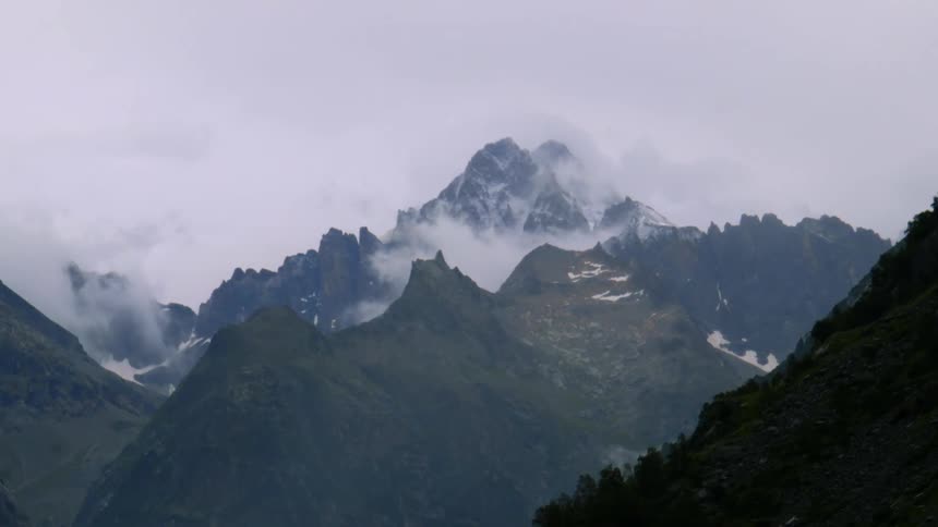 Clouds around a mountain peak