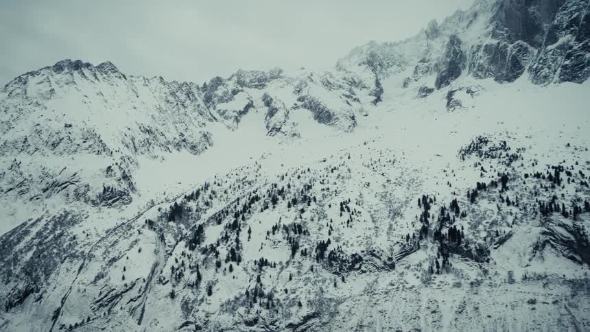 A view of a mountain range covered in snow