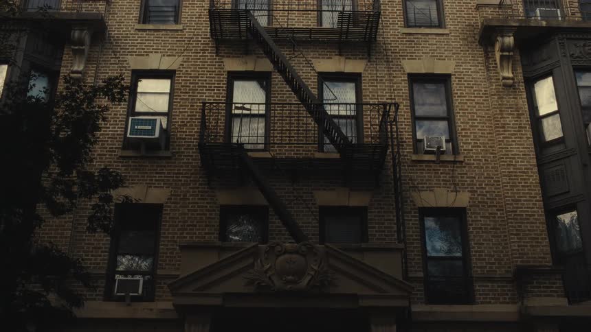 Stairs and balcony landings outside of an apartment building