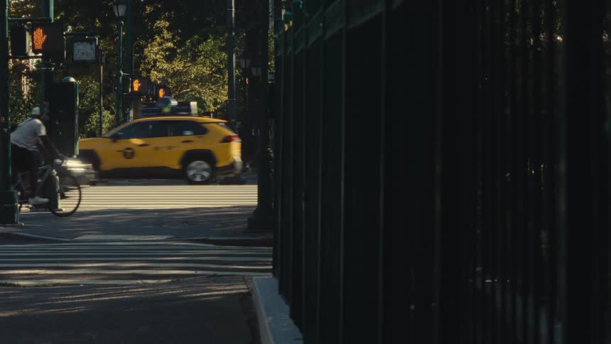 People walking around an intersection in a city