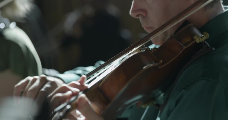 A man plays a violin
