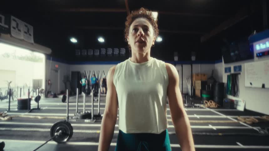 A woman exercising in a gym