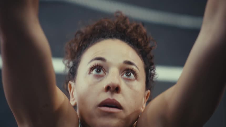 A woman doing exercises in a gym