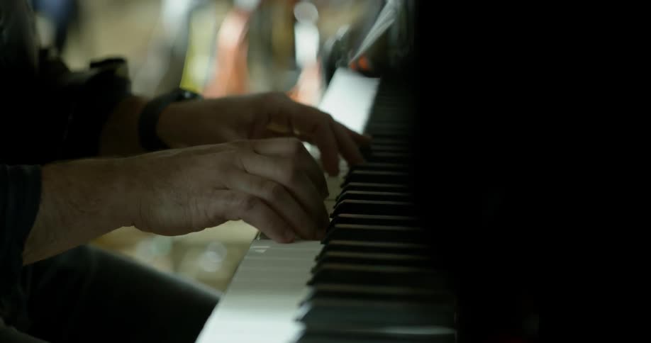 A man plays the piano