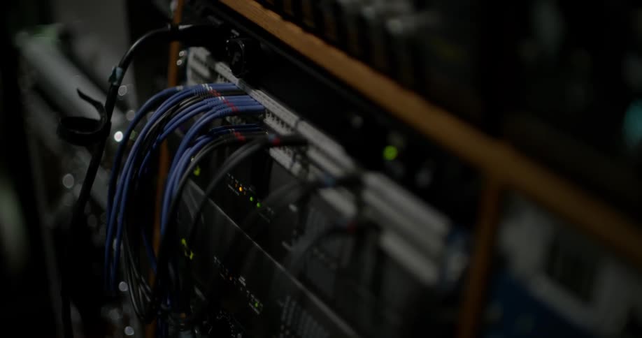 Wires going into a rack full of equipment