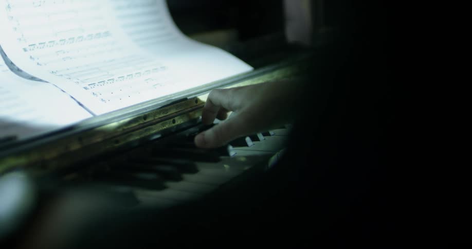 A person plays piano