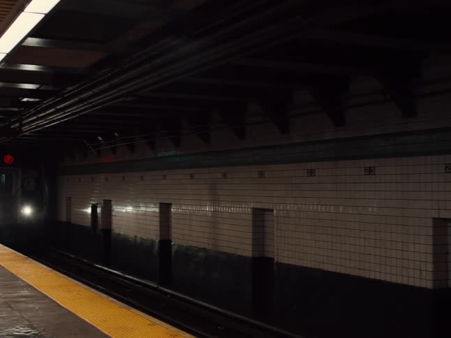Train arriving at subway platform