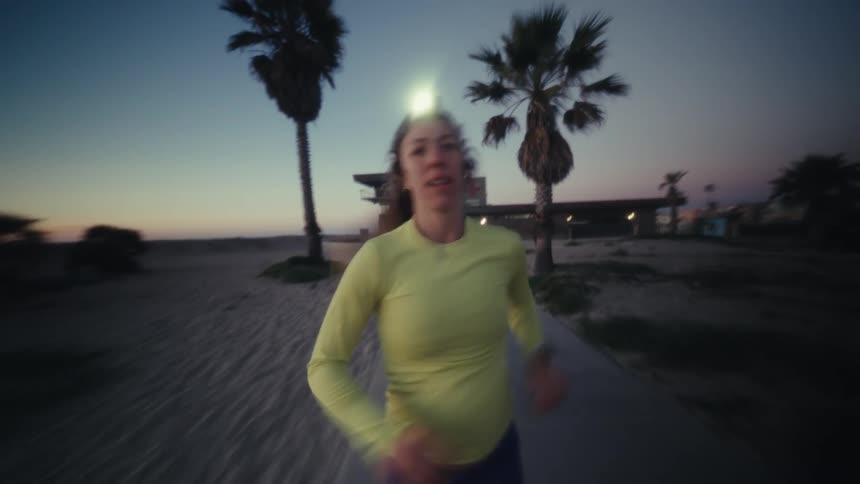 A view of a woman running outdoors