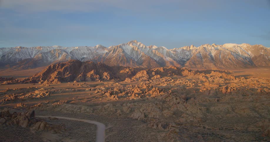 Aerial view of rocks and mountains at sunrise