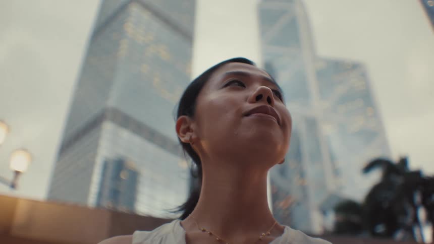 Woman enjoying the view of buildings around her