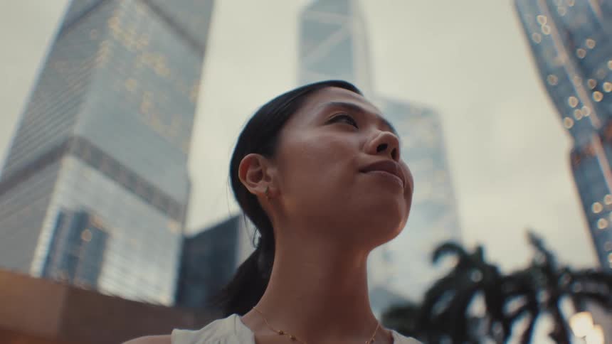 Woman enjoying the view of buildings around her