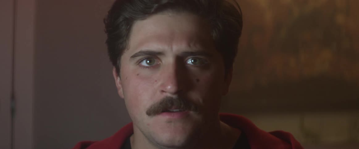 Close up of a man with a mustache